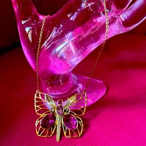 Swarovski butterfly neck with pink and multicolored crystals.